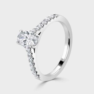 Oval diamond single stone ring with diamond shoulders