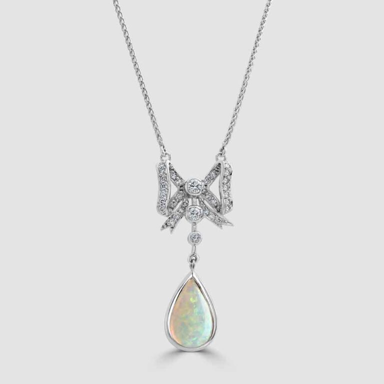 18ct white gold opal and diamond pendant