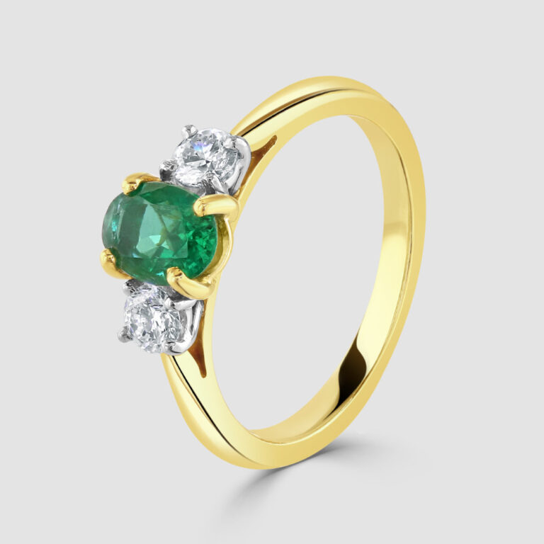 18ct Emerald and yellow gold diamond ring
