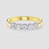 Platinum and 18ct yellow gold, half eternity diamond ring