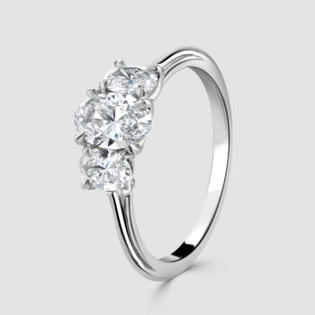 Oval platinum and diamond 3 stone ring