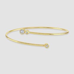 Torque style yellow gold diamond bangle