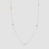 Silver necklace with plain and gold plated pebble stations