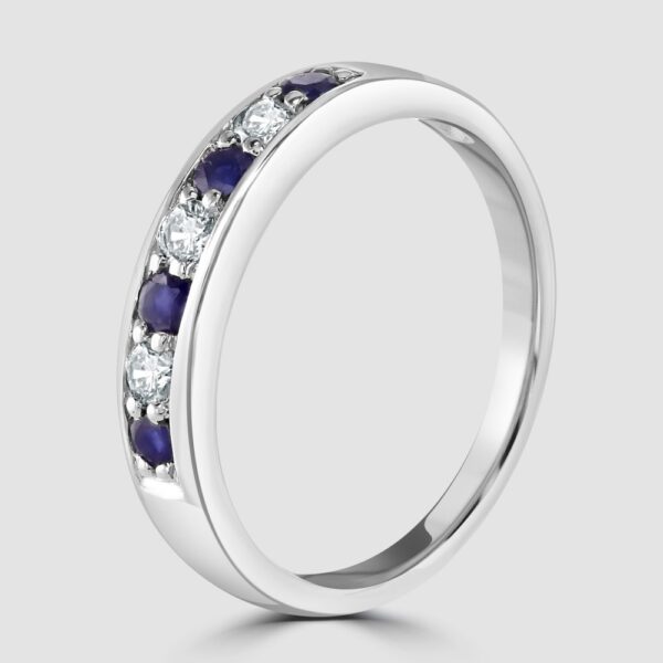 Sapphire and diamond seven stone half eternity ring