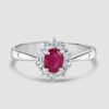 Oval claw set ruby and diamond cluster ring