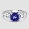 Sapphire ring with baguette diamond shoulders