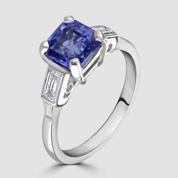 Sapphire ring with baguette diamond shoulders