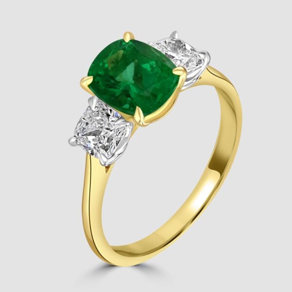 Superior emerald and diamond three stone ring