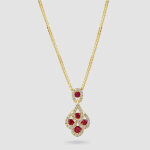 Ruby and diamond peacock design pendant in 18ct yellow gold