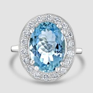 Oval aquamarine and diamond cluster ring